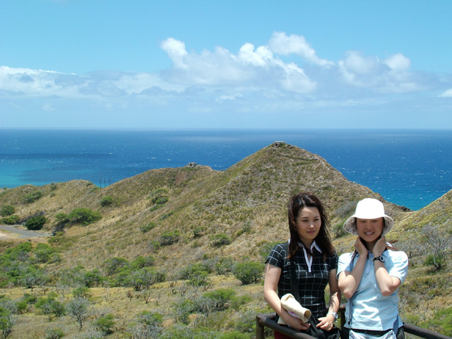 Visitors pose at Diamond Head