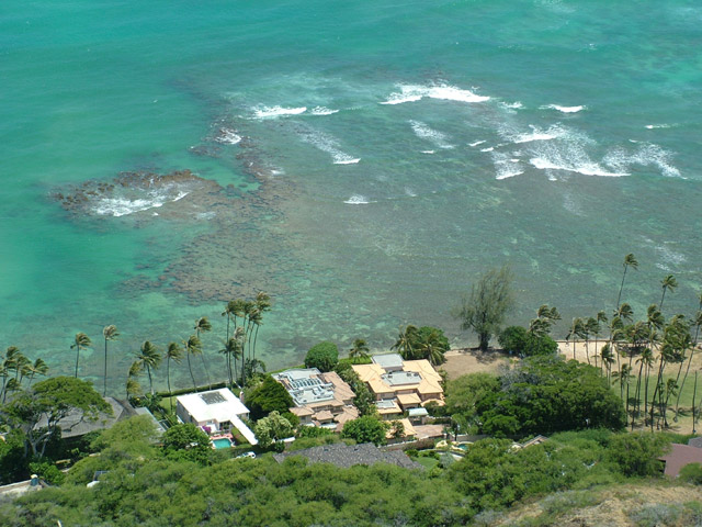 Coral reef and houses near Diamond Head Crater